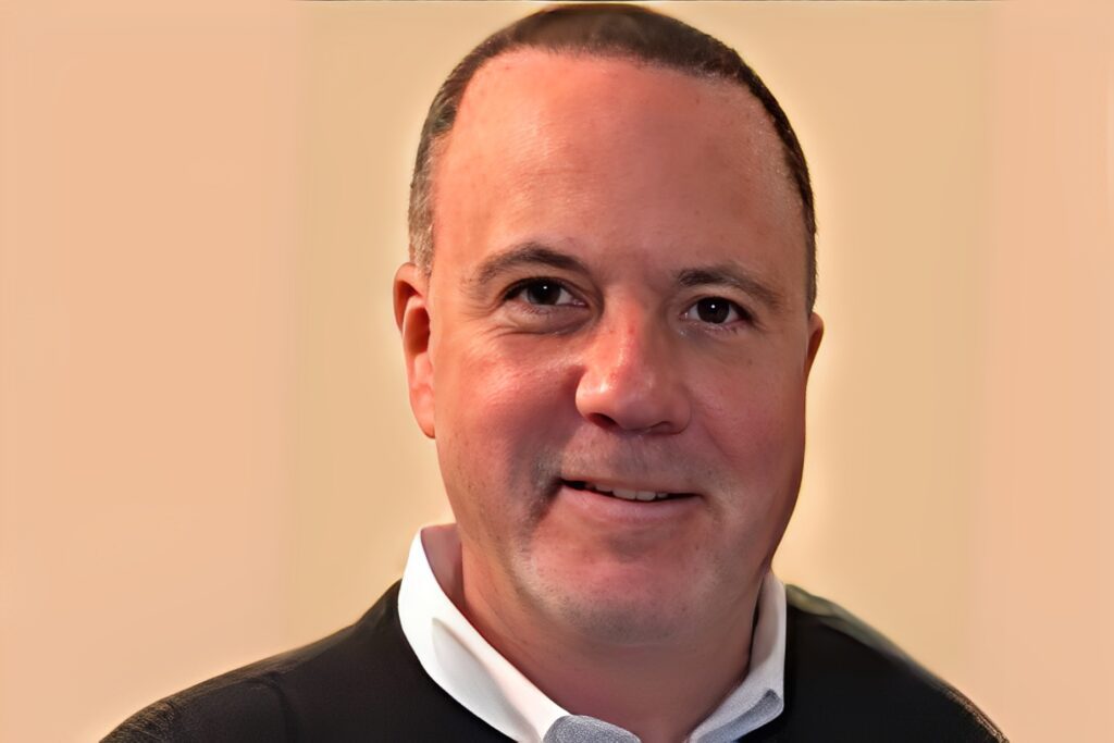 Portrait of a bald man smiling