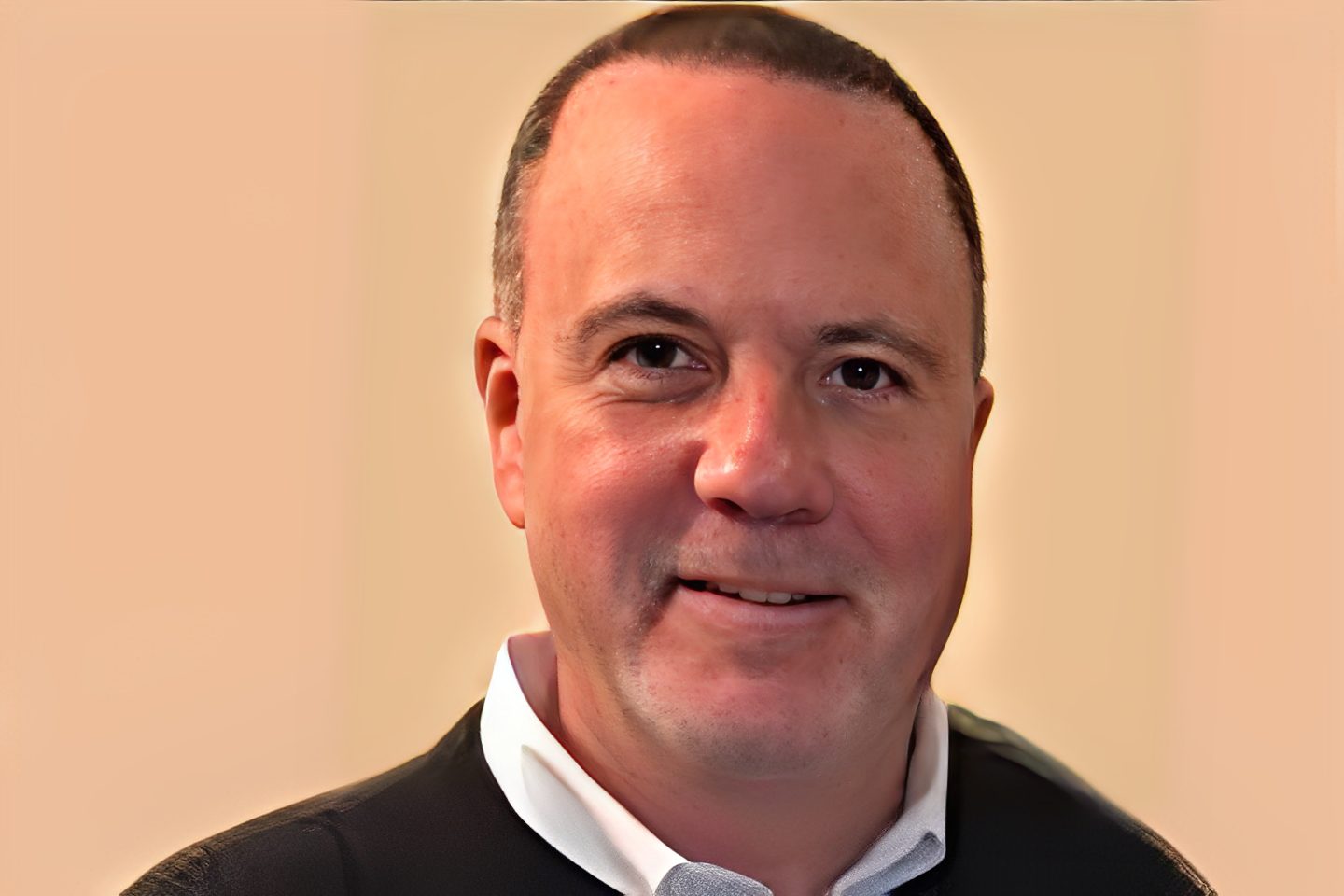 Portrait of a bald man smiling