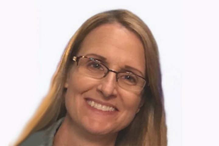 Smiling woman with glasses