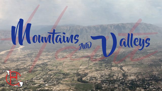 Aerial view of a valley with 'Mountains and Valleys' text overlay.