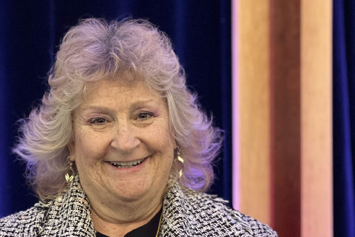 Woman in a plaid jacket