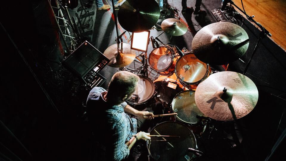 Overhead view of drummer playing drums